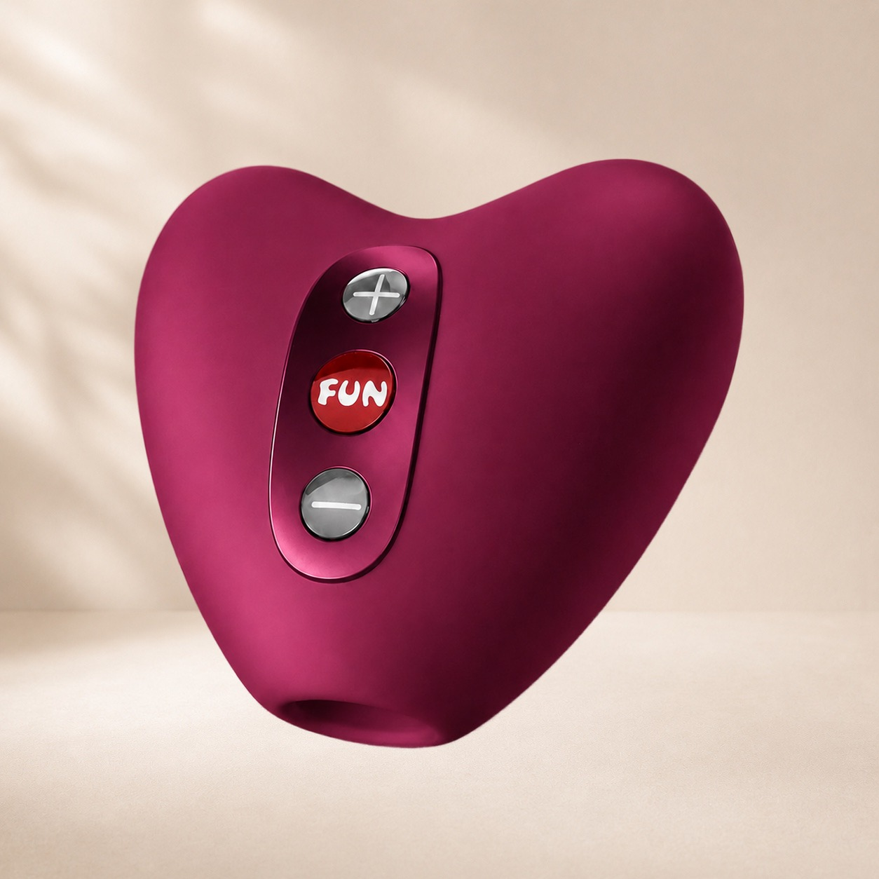 Fun Factory Libera palm-sized vibrator in raspberry silicone